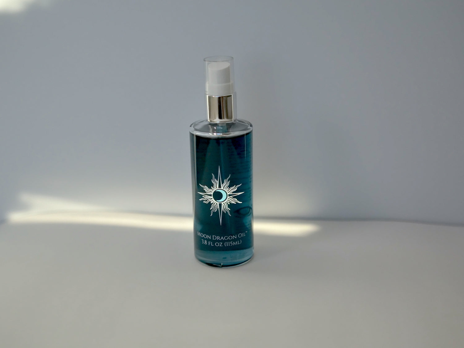 blue bottle with label on a white background